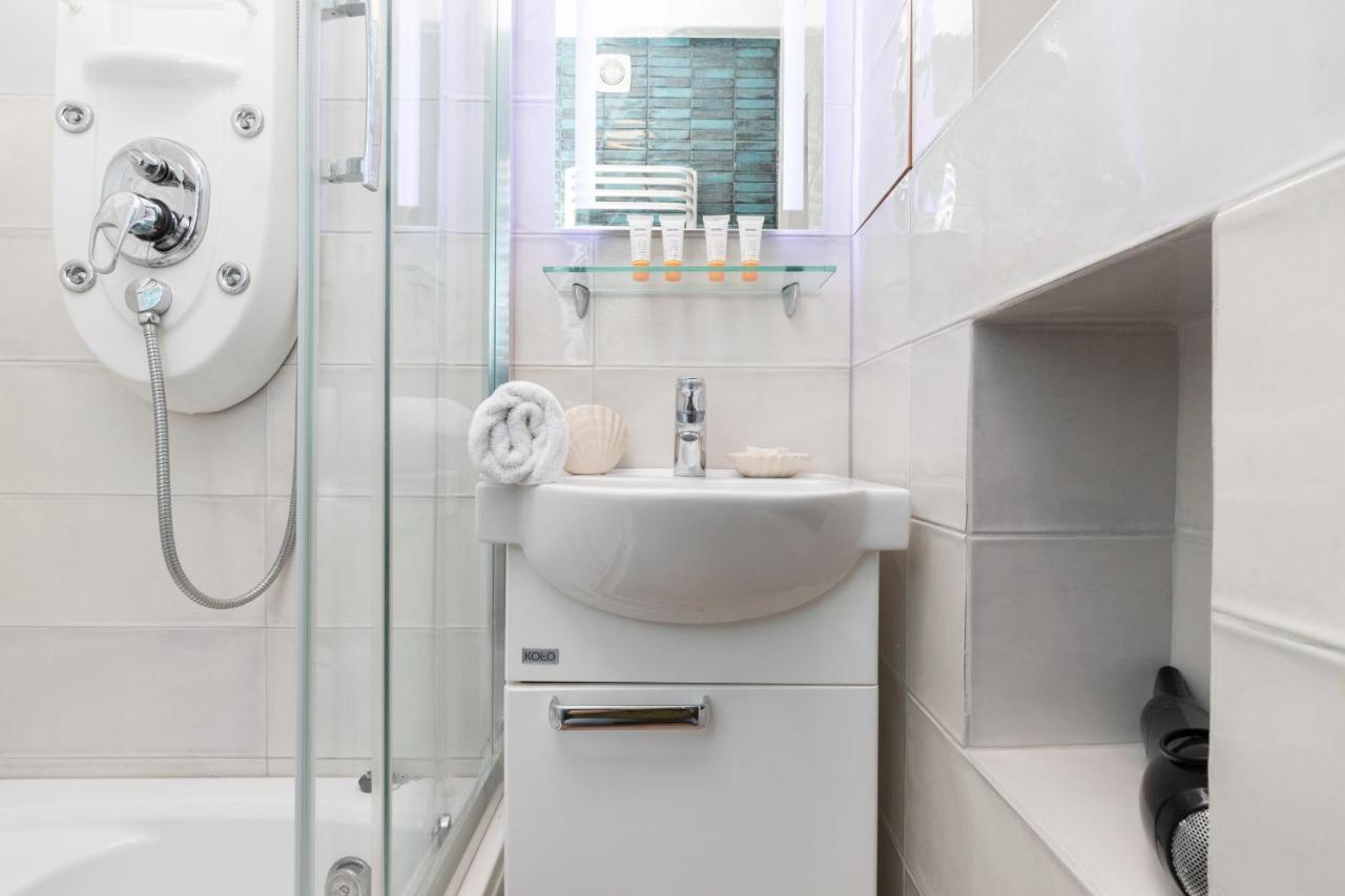 Mokotow Apartments Reytan By Noclegi Renters Warsaw Exterior photo